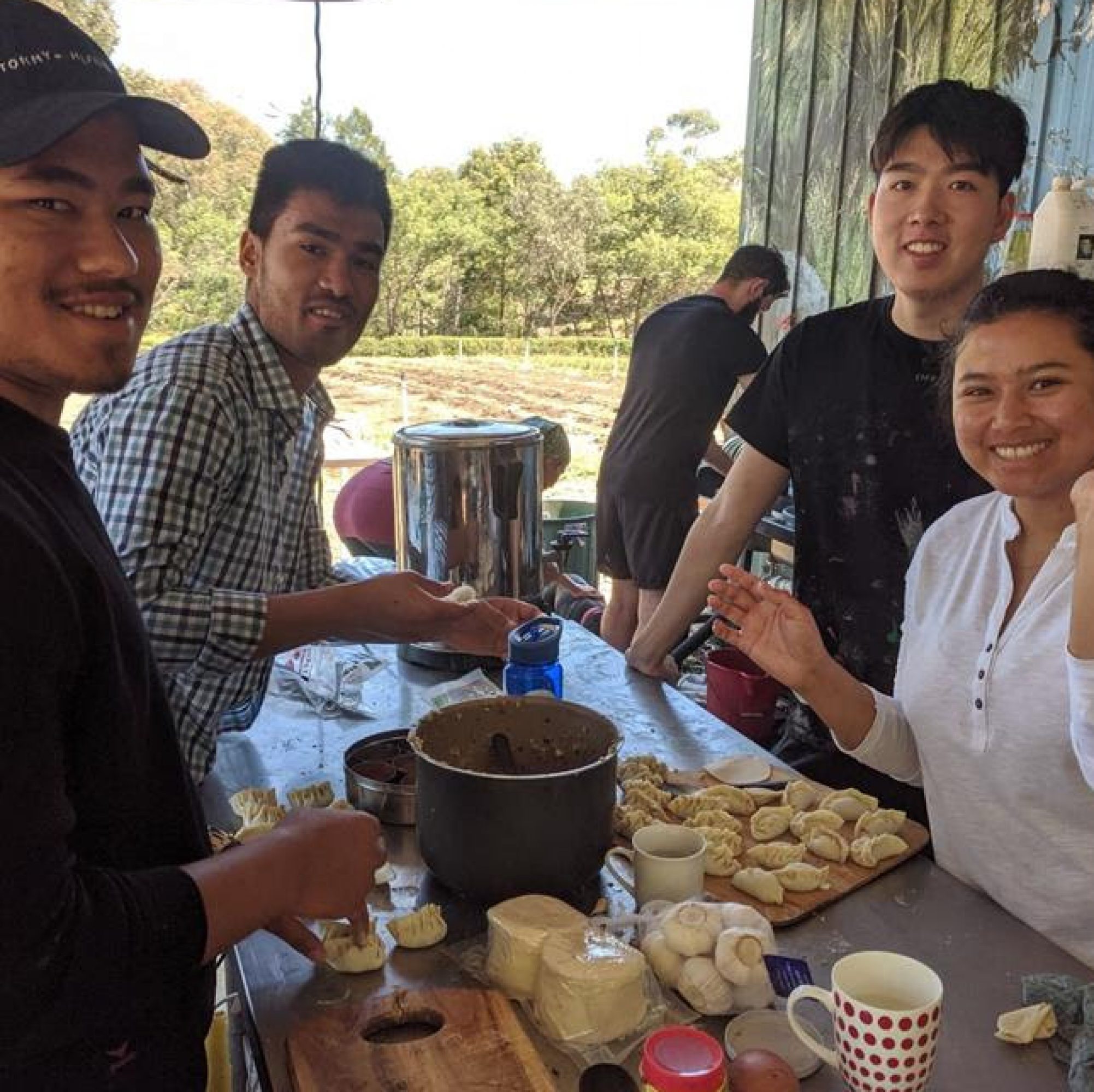 Joes Garden volunteers making momos