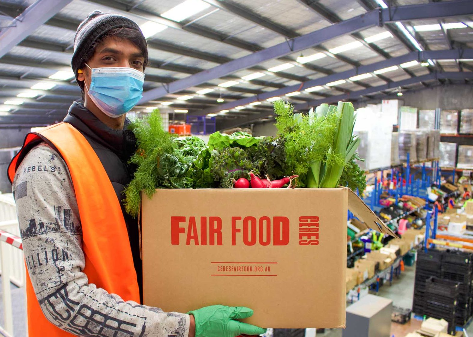 Prasad_mezzanine_Leo-Ricardo - CERES Fair Food Prasad and veggies at the Fair Food warehouse