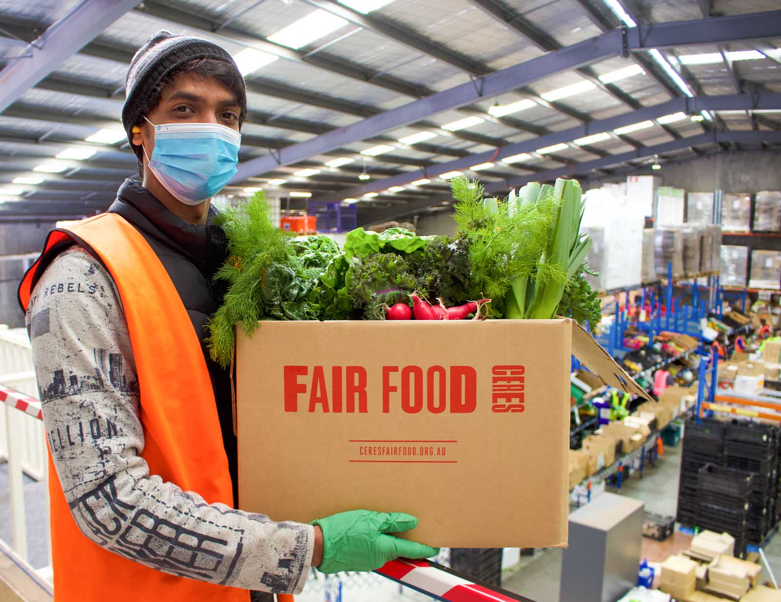 Prasad_mezzanine_Leo-Ricardo - CERES Fair Food Prasad and veggies at the Fair Food warehouse