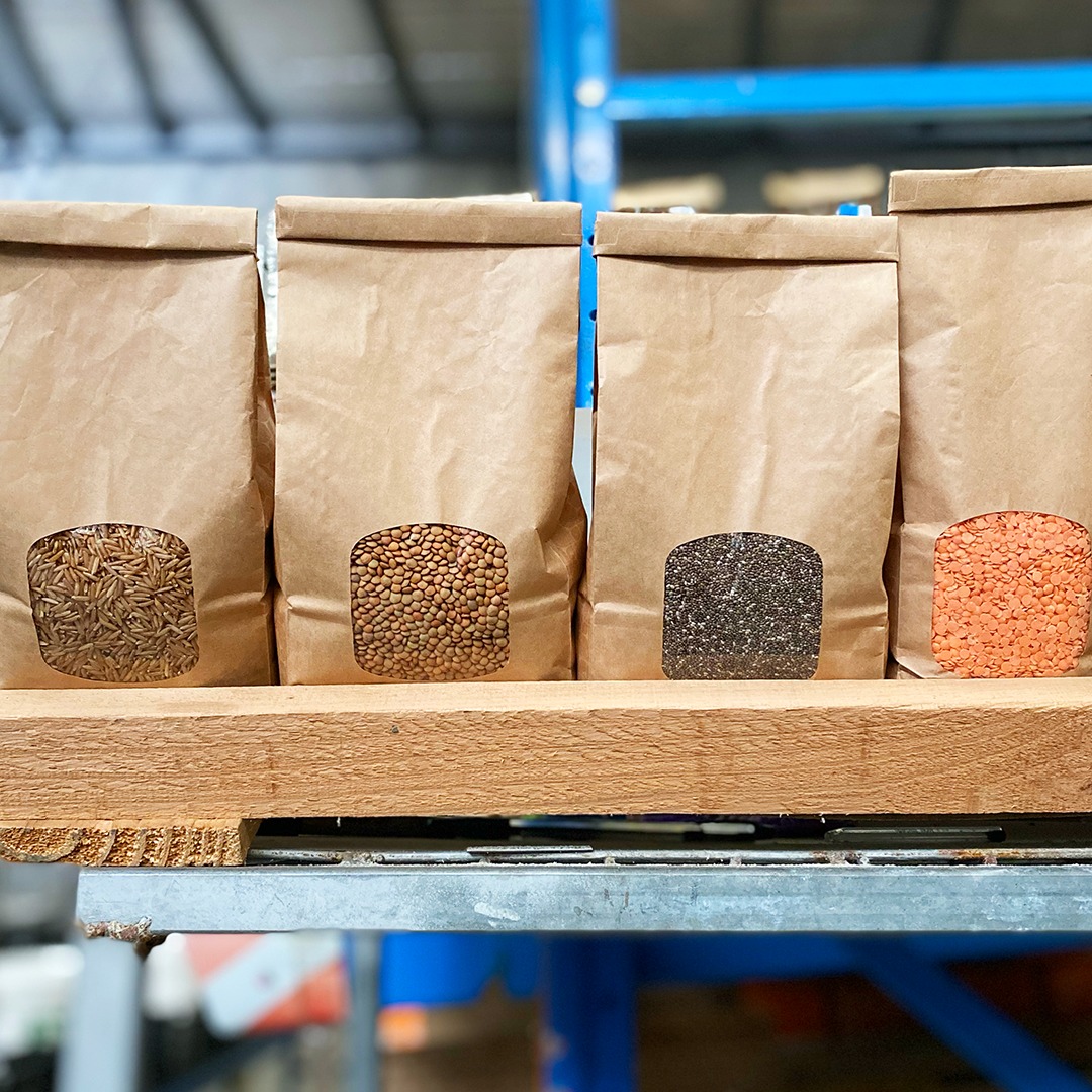 Bulk_pantry_staples_shelf - CERES Fair Food Bulk pantry staples lined up on a warehouse shelf