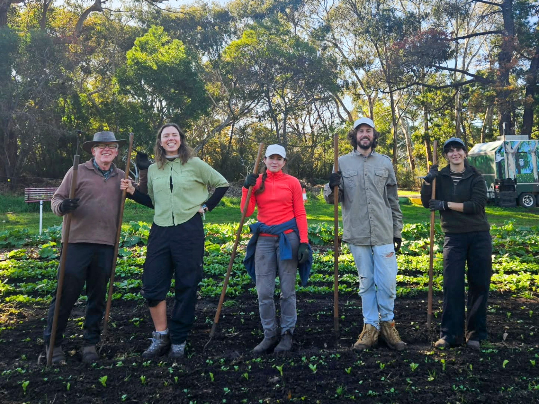 Screenshot - CERES Fair Food Volunteers with their weeding tools at Joe's Market Garden, Coburg