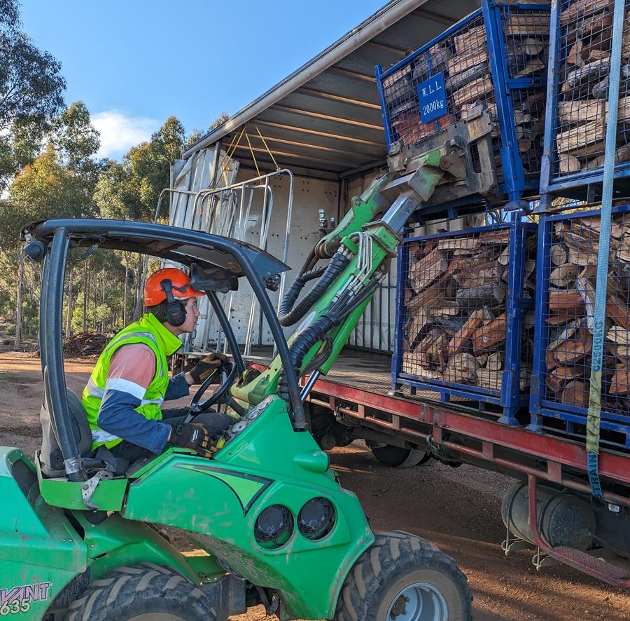 Wood4Good_loading-firewood - CERES Fair Food Sustainable firewood crates from Wood 4 Good and CERES Fair Wood.
