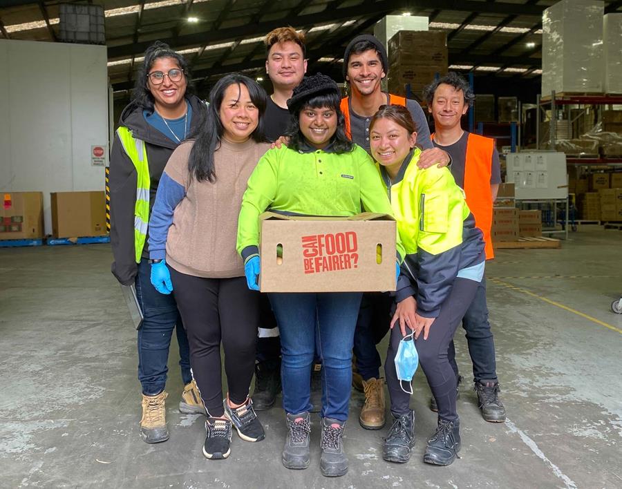 FF staff pose with new box design - CERES Fair Food Fair Food staff pose in the warehouse with new box design