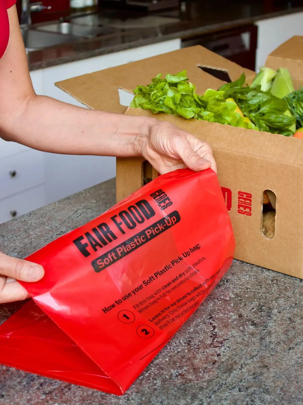 Soft Plastic Pick-Up bag, empty, on a kitchen bench